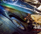 Brand eines Unterstandes greift auf PKW über