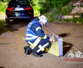 Brand eines Unterstandes greift auf PKW über