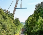 Brücke mit 55 Tonnen raus und 90 Tonnen rein. Platz 3 der größten Kräne der Welt in BURGSTETTEN