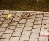 Streit im Straßenverkehr eskalieren das Schüsse fallen - Pizzabote angeschossen - Tatort gesichert mit Einsatzkräften in Anti Terror Schutzanzügen