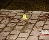 Streit im Straßenverkehr eskalieren das Schüsse fallen - Pizzabote angeschossen - Tatort gesichert mit Einsatzkräften in Anti Terror Schutzanzügen